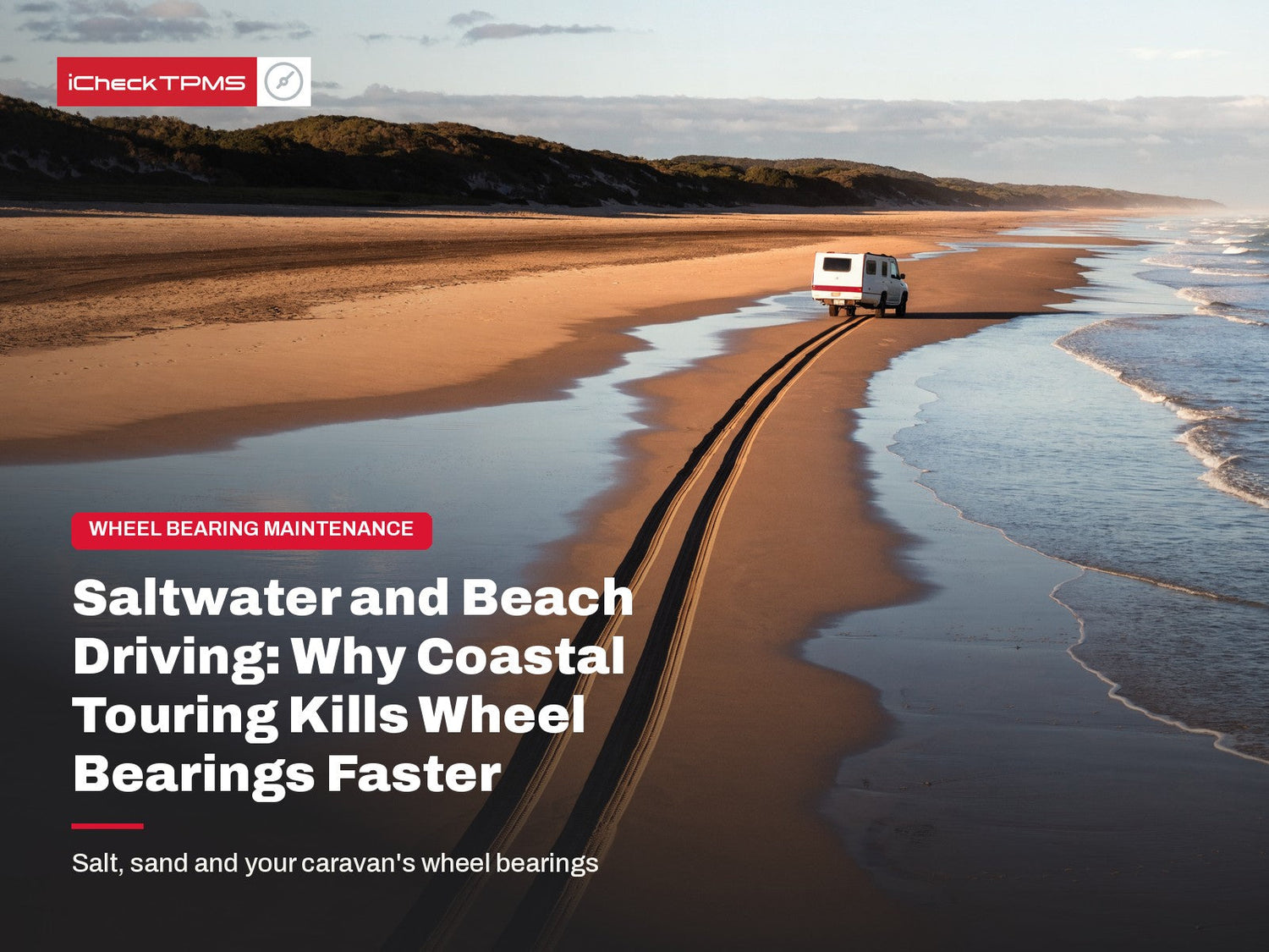 4WD towing a caravan along an Australian beach at low tide, where saltwater and sand accelerate caravan wheel bearing corrosion